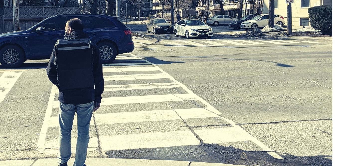 Uber Eats walker on street