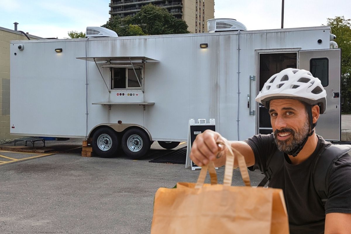 delivery biker outside ghost kitchen