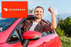 Man driving red car