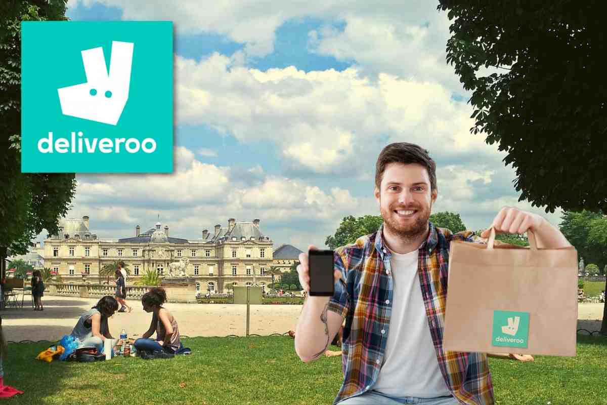 Man in park with his food order.
