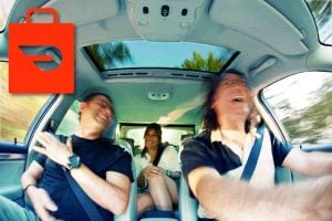Three guys driving in a car