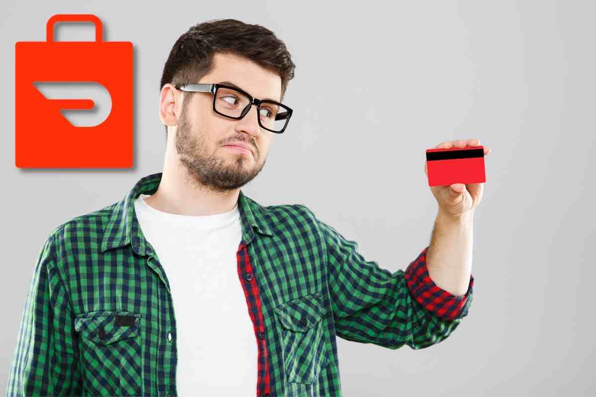 Unhappy man looking at red card.