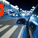 driving in city at night.
