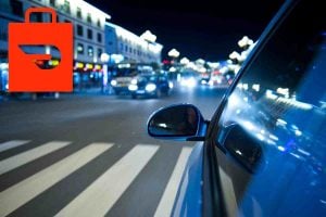 driving in city at night.